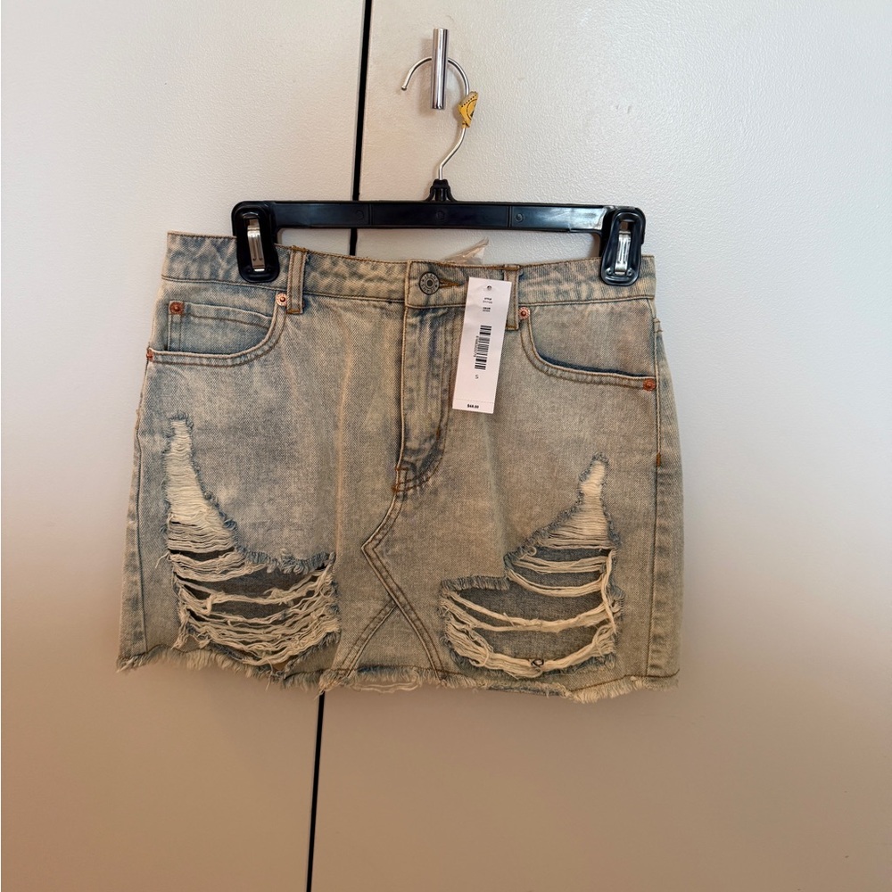 Ripped Light Blue Denim Mini Skirt - Casual Distressed Style